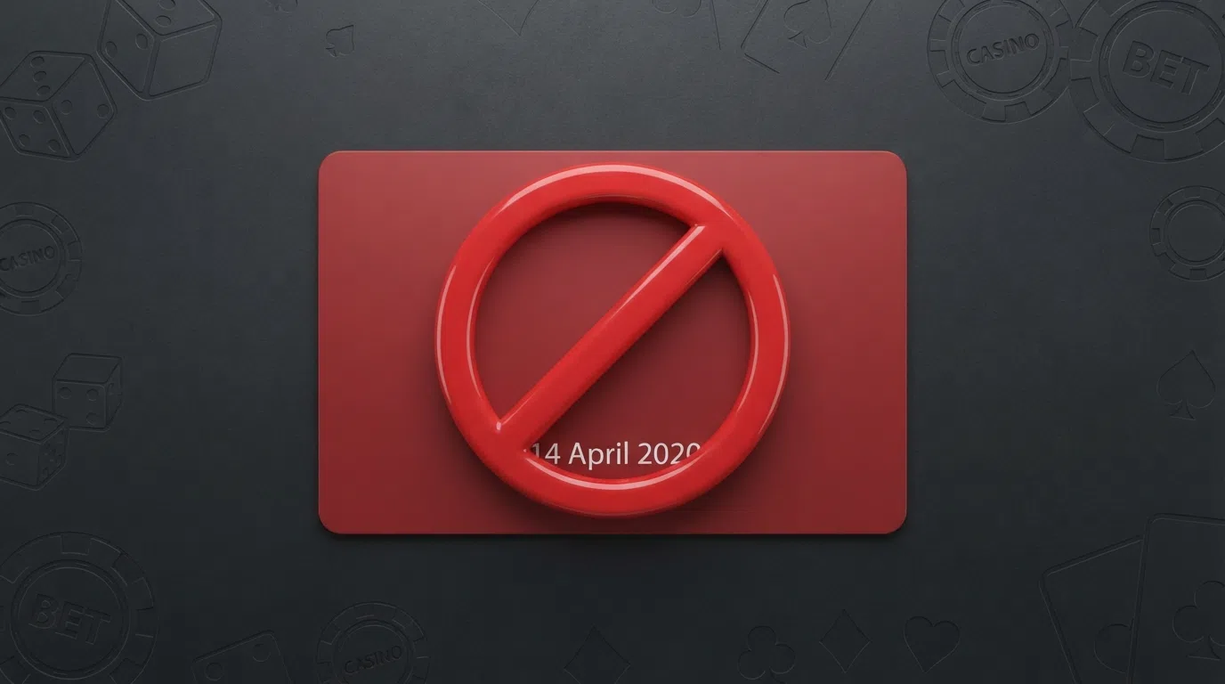 A stylised prohibition sign over a credit card on a dark casino-branded background, with the date 14 April 2020 visible